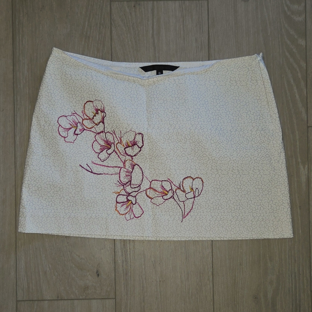 Chic White Mini Skirt with Pink Floral Design